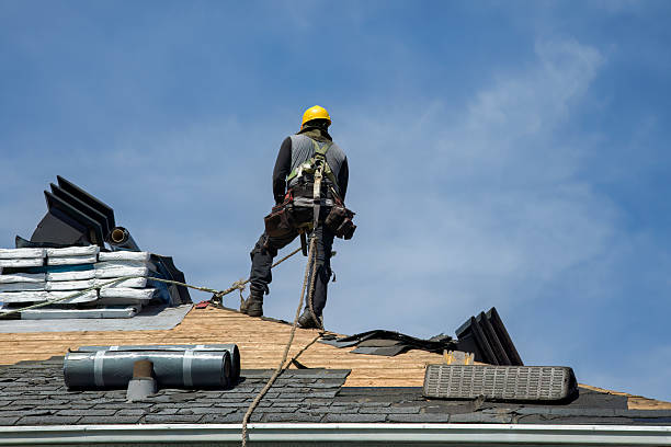 Professional Roof Replacement technician working in Alex, OK